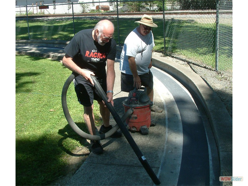 Ron Hesskamp and Bob Oge vacuum the loose carbide prior to running July 9-10
